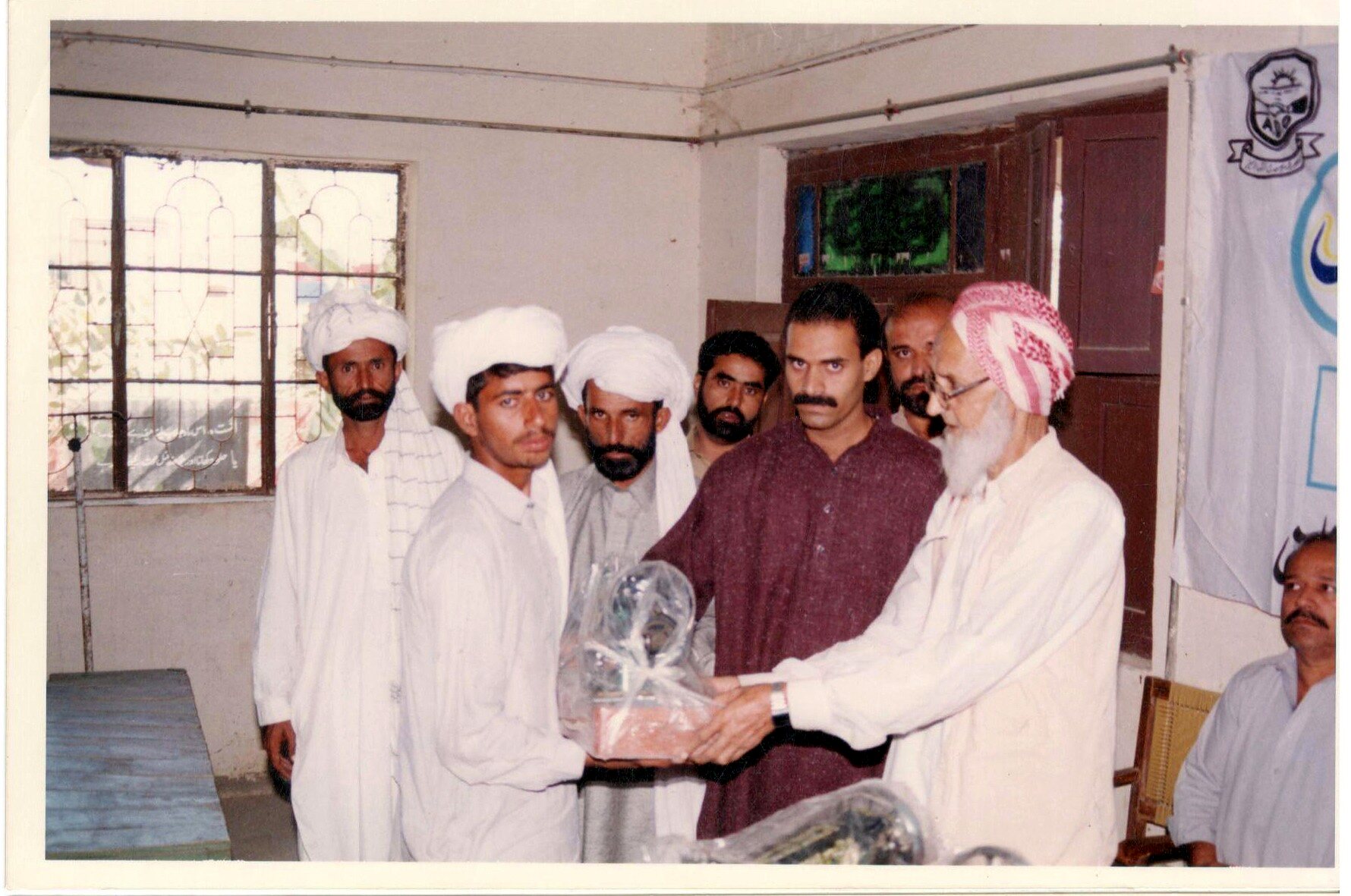 Community representative receiving relief assistance