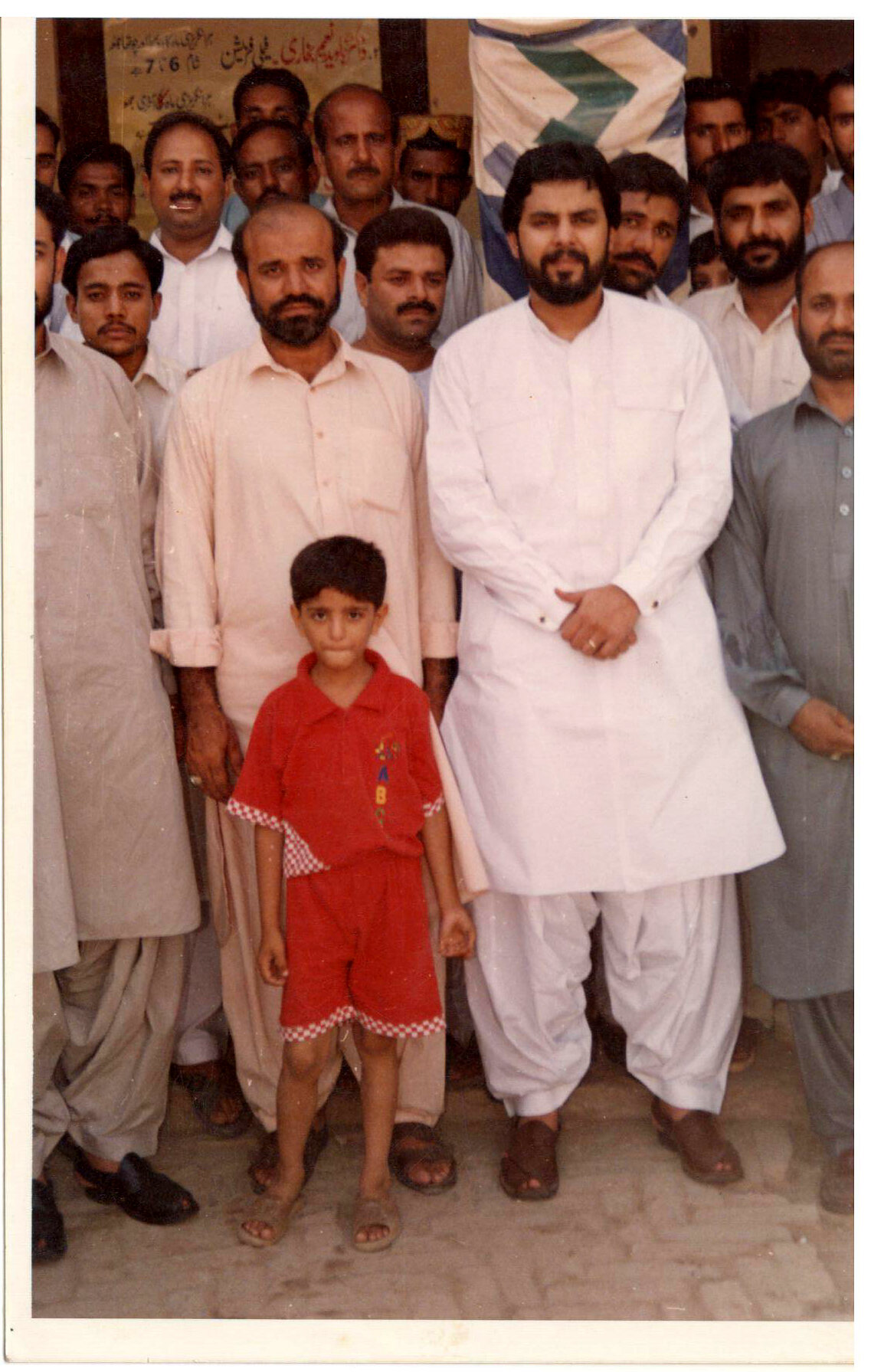 Community members gathered for a programme photograph