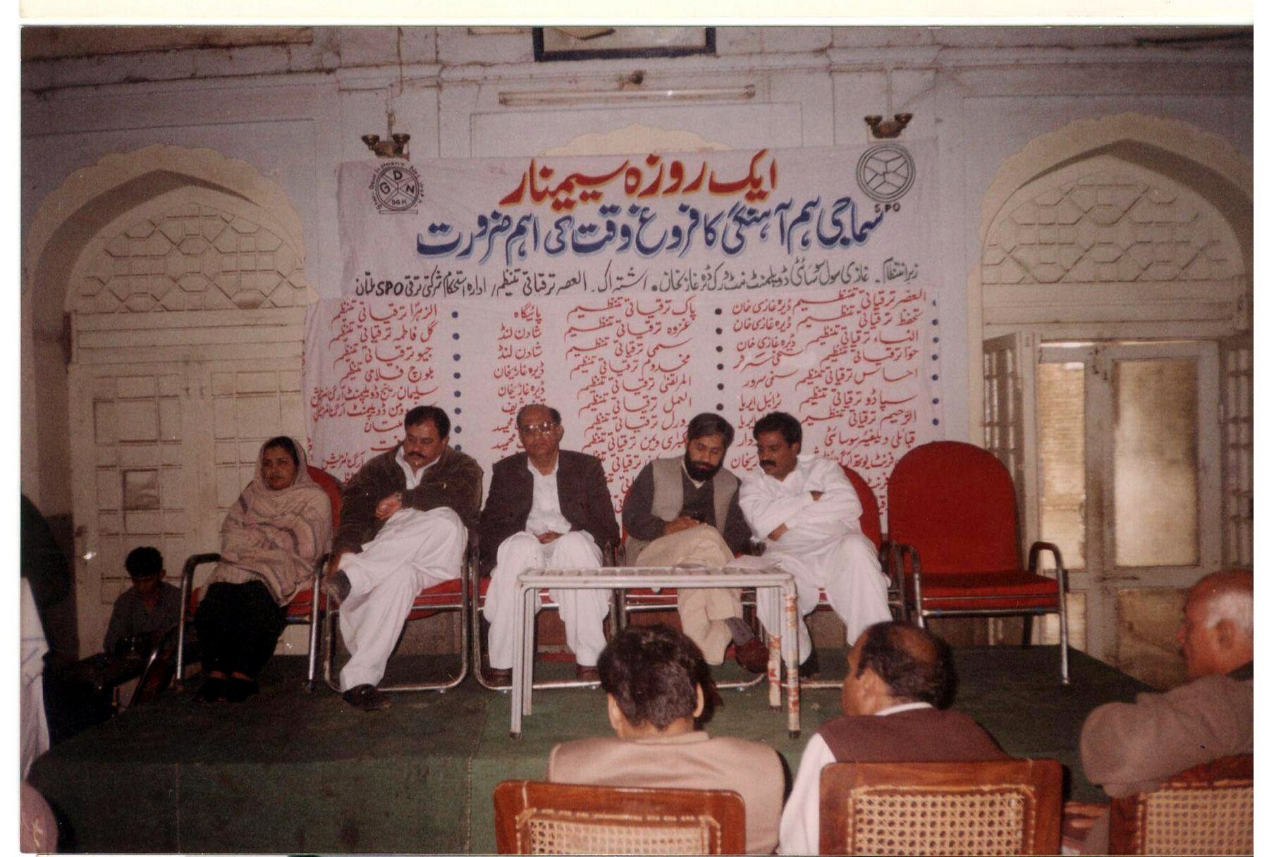 Speakers participating in a public forum