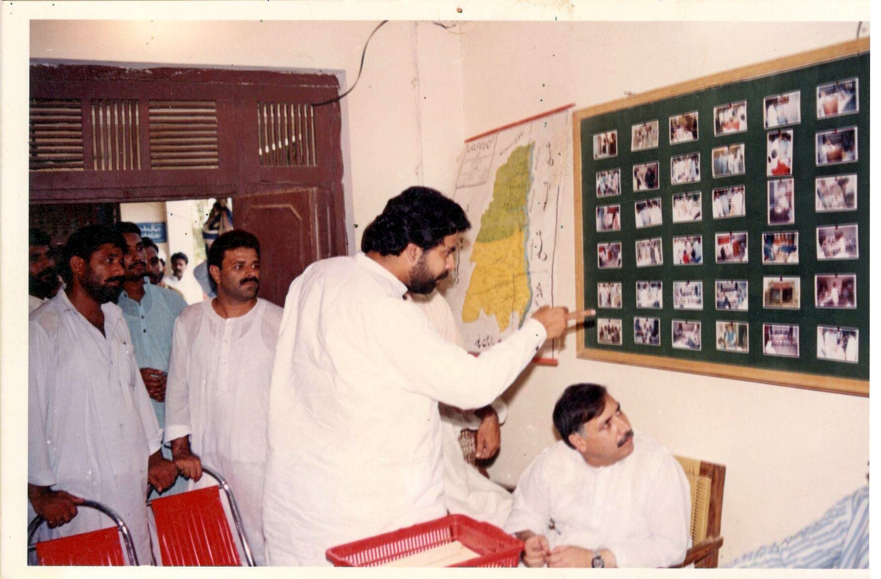 Visitors viewing a community-awareness photo display