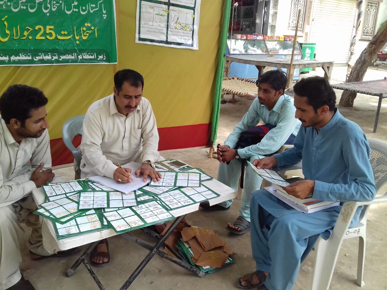 Facilitators presenting civic information