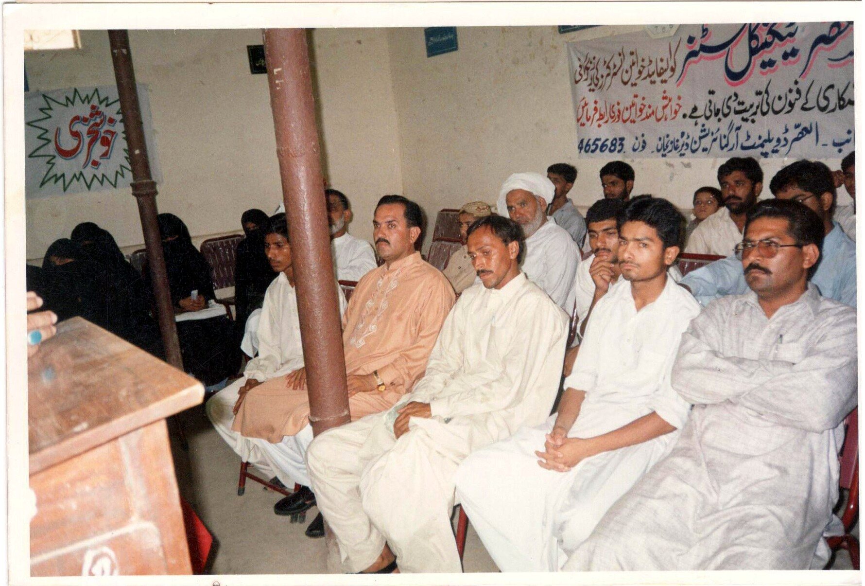 Participants attending a community dialogue session