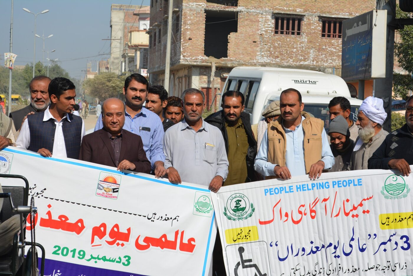 Community participants taking part in a Human Rights Day rally