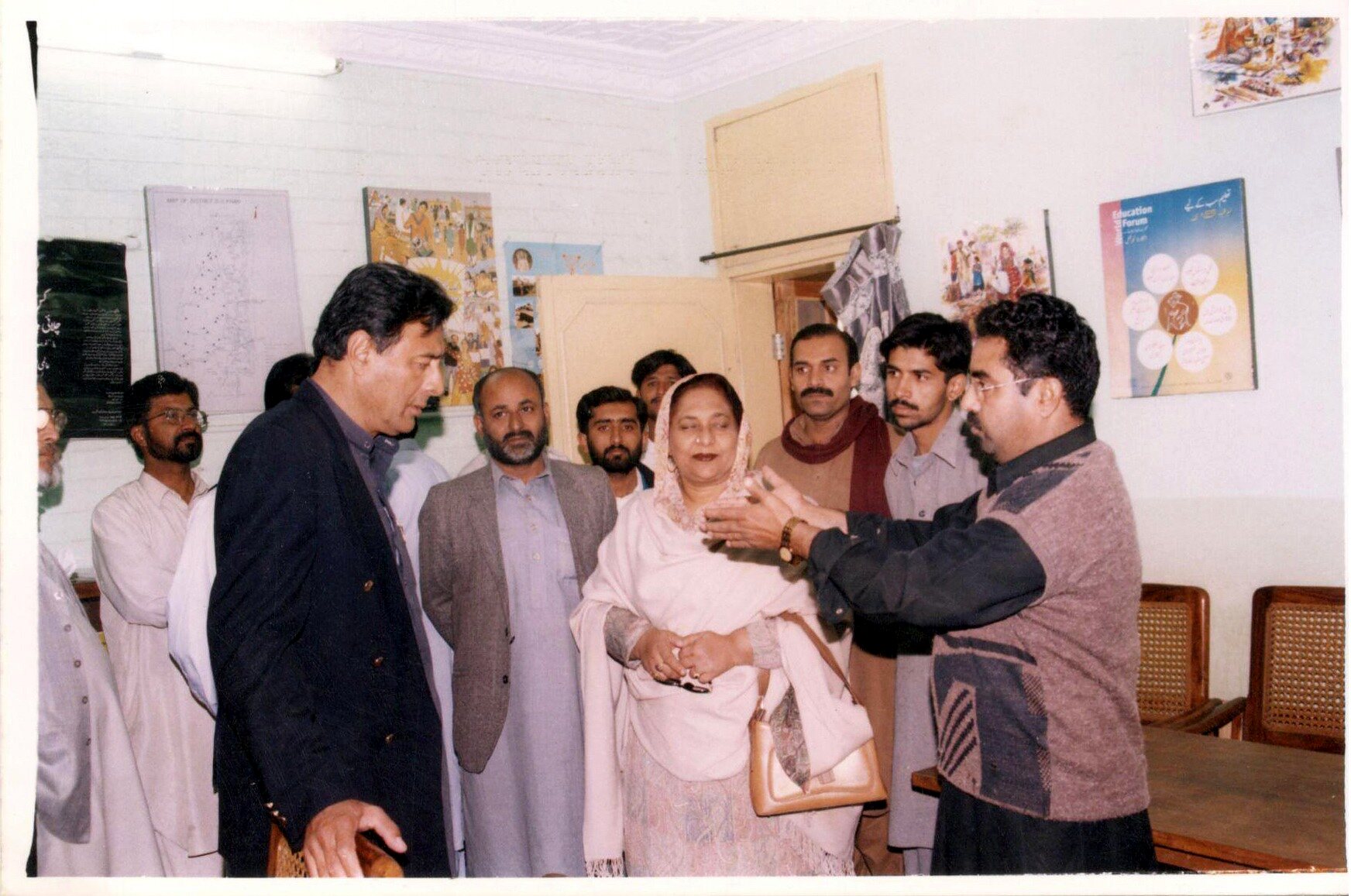 Programme participant receiving recognition at a community event