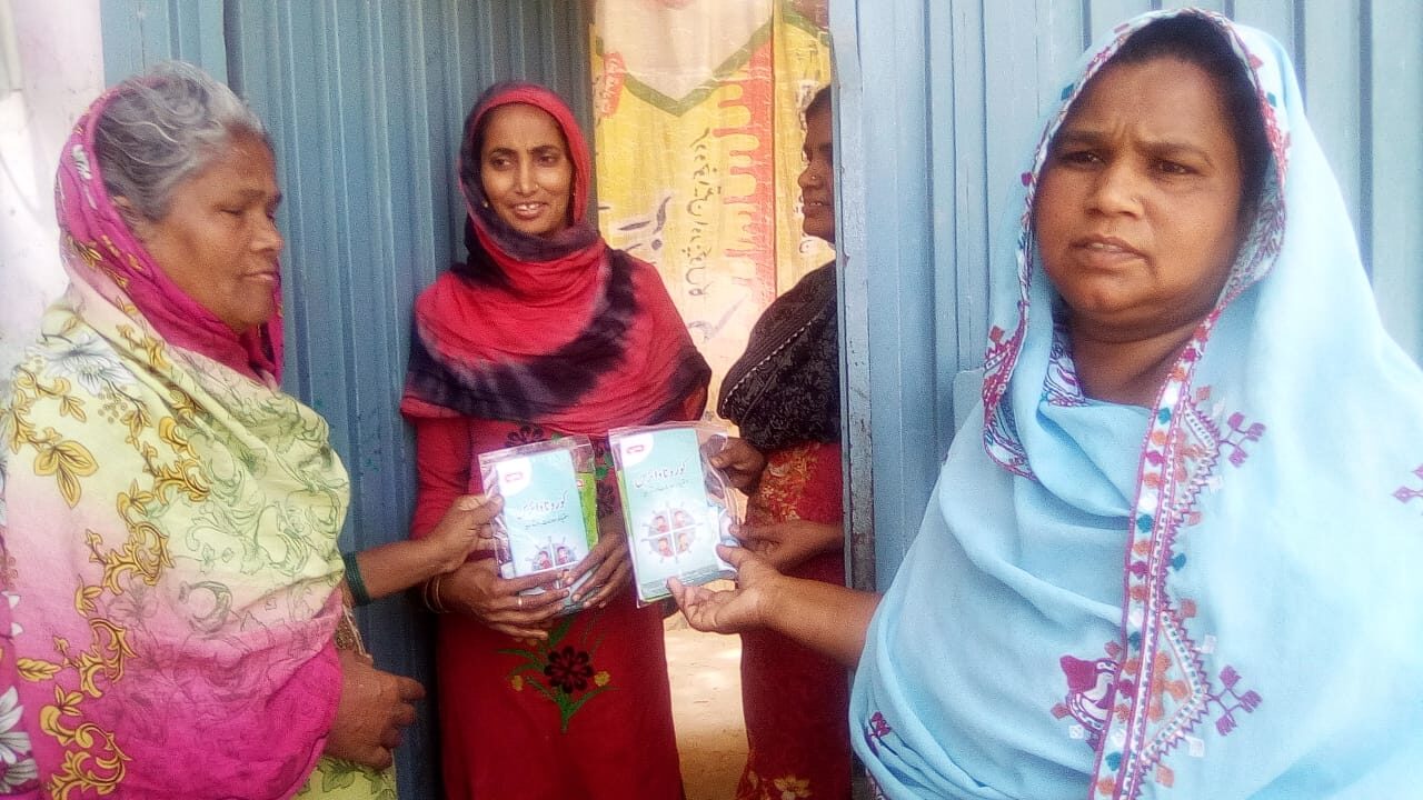 Women receiving relief supplies