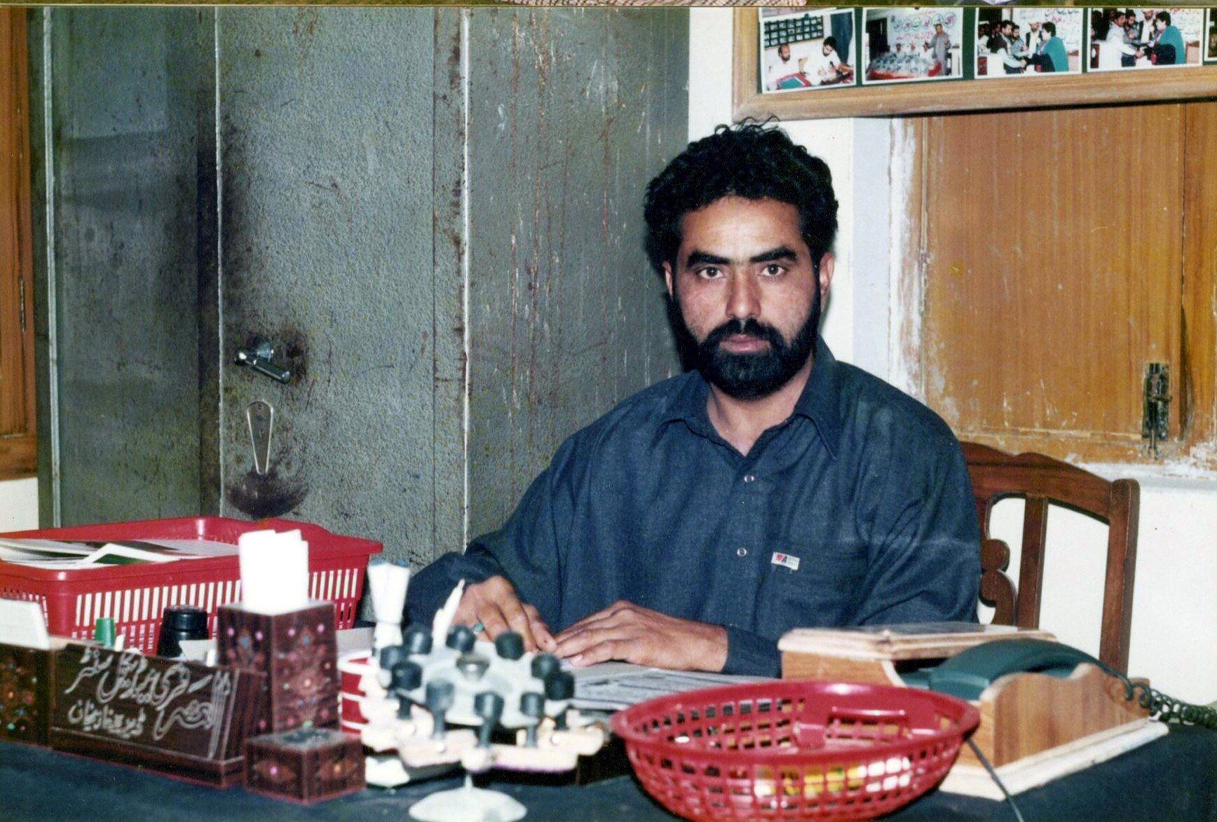 Staff member working in an Al-Asar office
