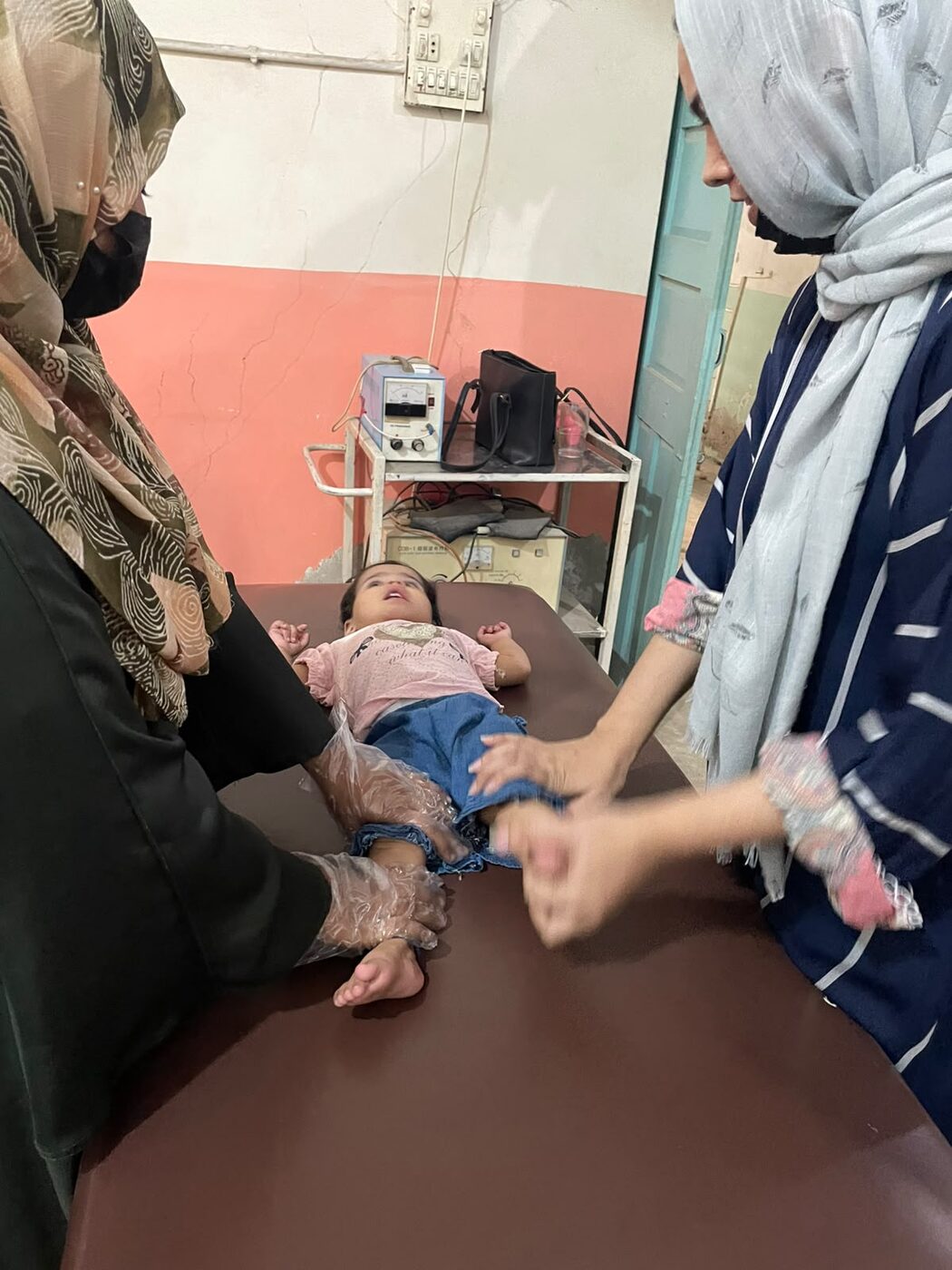 A child receiving clinical care