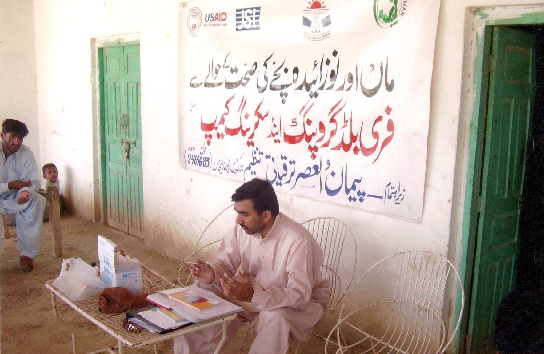 Health worker supporting maternal and newborn care in a community setting